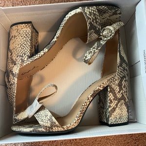 Quipid snake heels